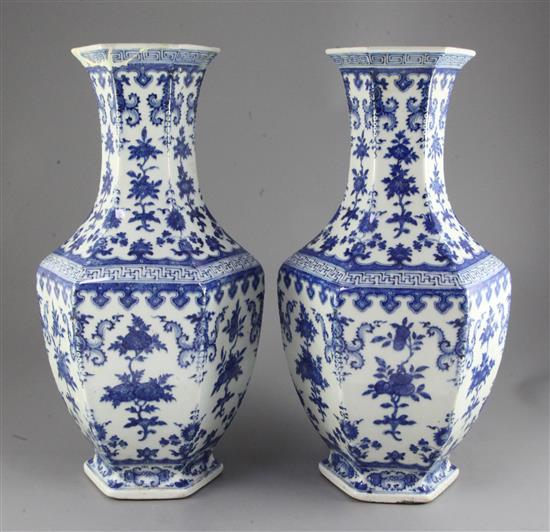 A pair of Chinese blue and white hexagonal baluster vases,